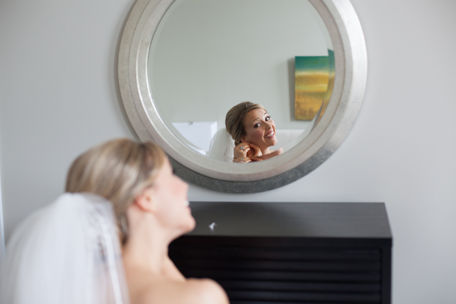Documentary portrait of the bride getting ready for her Muskoka wedidng