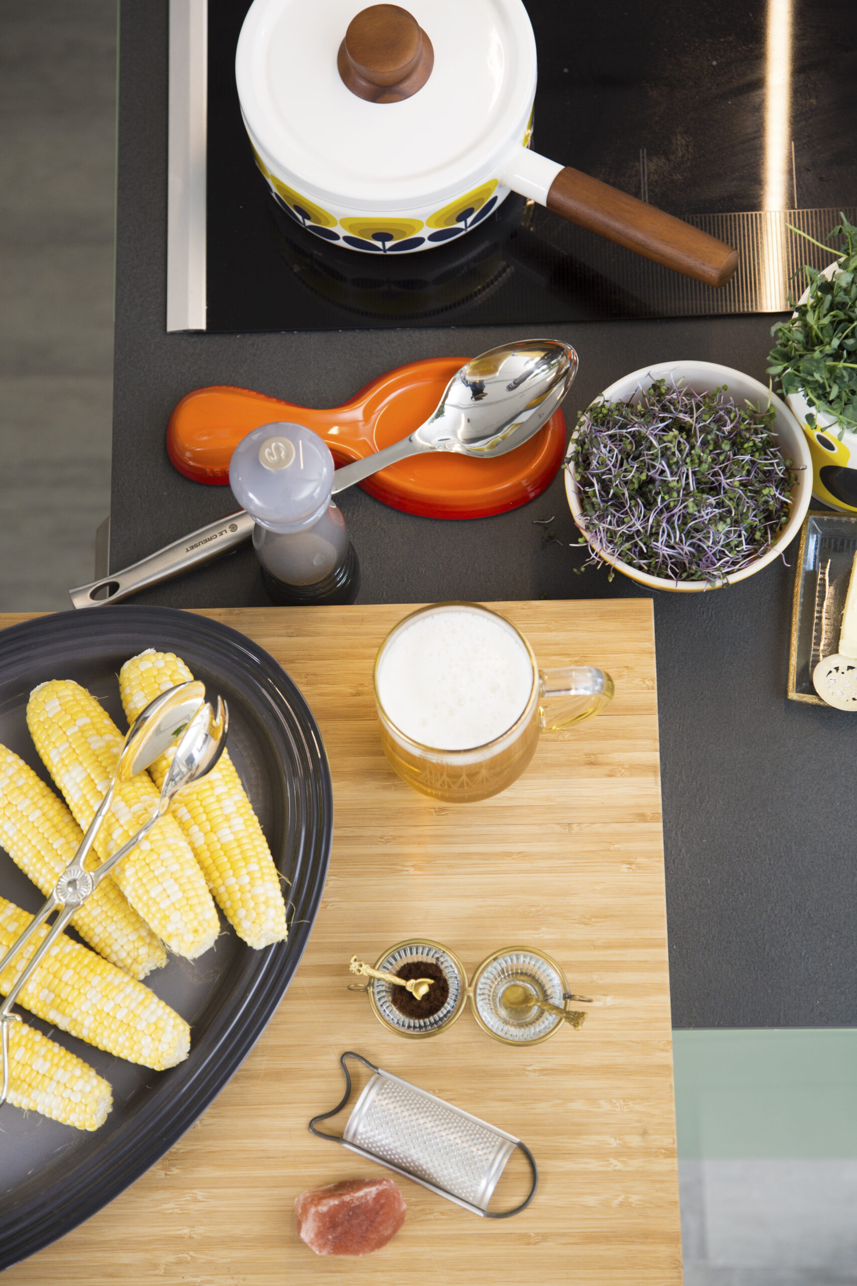 Styled food photo of corn on the cob